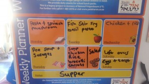 Menu planning on a magnetic board and stuck on the fridge, so everyone knows what's for dinner